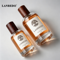 Flacon de parfum en verre transparent personnalisé de luxe avec logo, cylindrique, 50 ml, 100 ml, flacon de parfum vide avec bouchon en bois naturel
