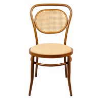 Chaise en rotin nordique rustique à dossier rond pour la lecture et les loisirs, idéale pour les maisons d'hôtes, cafés et hôtels, mobilier de maison