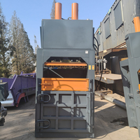 Presse à balles verticale hydraulique 60 tonnes pour le recyclage des déchets de papier, du carton, des bouteilles en plastique, des canettes en aluminium