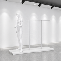 Présentoir de vêtements autoportant blanc à deux poteaux avec base de mannequin pour aménagement de boutique