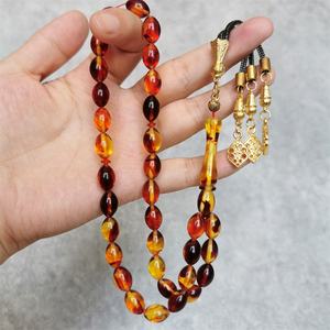Vente chaude, joli parfum, imitation ambre, Tasbsih rouge, 8*12mm, 33 perles de prière, Tesbih musulman, chapelet <span class=keywords><strong>avec</strong></span> pompon noir doré - Product Image 3