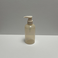 Flacon pompe rond en PET semi-transparent beige ambré de 200 ml (6 oz) pour sérum, huile nettoyante, lotion corporelle