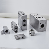 Fabricant de bobines de collecteur hydraulique, usinage CNC de précision, bobines de collecteur non standard en acier inoxydable sur mesure pour