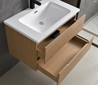 Meuble de salle de bain suspendu en bois massif moderne avec lavabo en céramique et finition résistante à l'eau