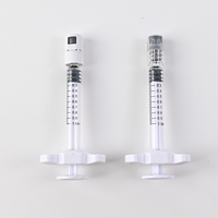 Seringue en verre stérilisée de 1 ml pour produits de comblement cutané, avec embout Luer Lock fin, poignée bleue et tige de piston