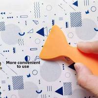 Outil de pose triangulaire jaune en plastique, directement de l'usine, pour l'installation de film teinté et de vinyle sur vitres de voiture