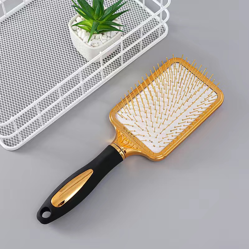 #4 Brosse à cheveux électrique