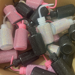 Bouteille de rinçage en plastique avec strass pour le nettoyage des extensions de cils - Product Image 1