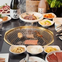 Barbecue japonais rond au charbon de bois et plaque de cuisson pour restaurants coréens de barbecue commerciaux
