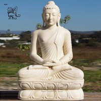 Décoration religieuse extérieure en pierre de lave naturelle noire Statue de bouddha de jardin en marbre Taille réelle Inde Sculpture de bouddha assis