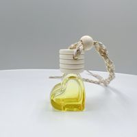 Flacon diffuseur de parfum pour voiture en verre en forme de cœur de 5 ml, vide et rechargeable, pour huiles essentielles, à suspendre, pour la décoration
