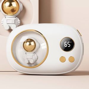 Novedades 2026: Set de Regalo Portátil con Calentador de Manos USB Recargable, Diseño de Astronauta, Mini Banco de Energía de Silicona - Product Image 1
