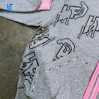 Ensemble de survêtement deux pièces en coton 400 g/m² avec logo personnalisé, comprenant un sweat à capuche court zippé orné de strass et un pantalon de jogging ample