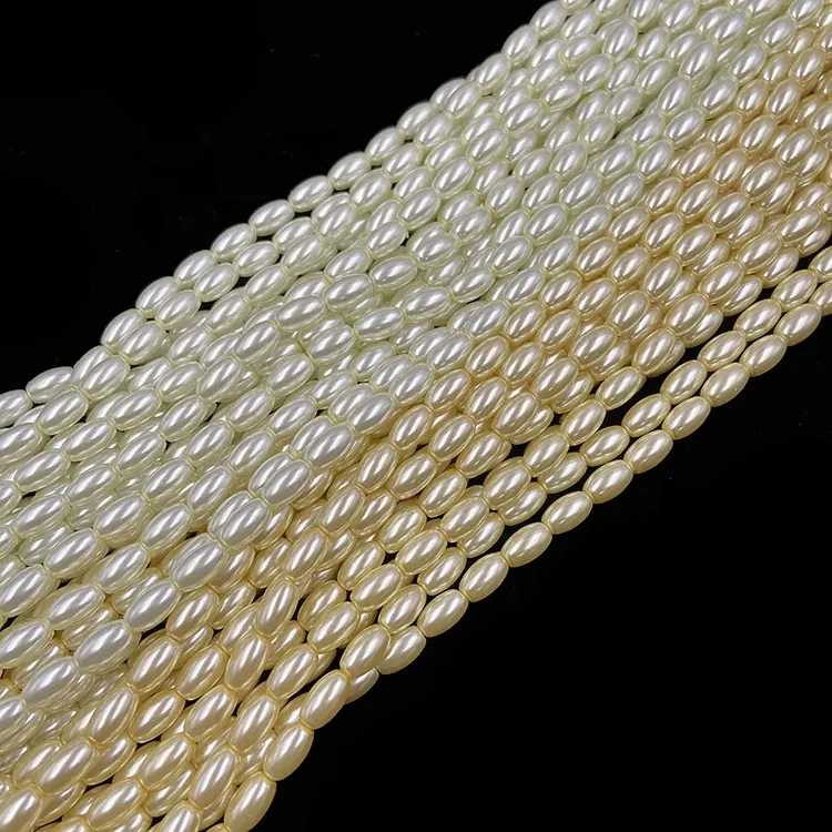 Stock à vendre usine de perles ivoire et crème 6x10mm prix de riz perles pour bracelets