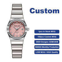 Montre pour femme en acier inoxydable de luxe avec logo personnalisé, mouvement à quartz original, aiguilles lumineuses, échelle de diamants, date, pour femmes