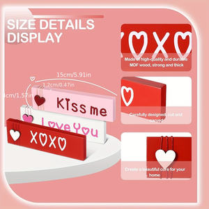 木製の「愛してる/キスしてください/XOXO」のスローガンが入ったハート型のセンターピース3個。 バレンタインディナー用の赤・ピンク・白の3Dデザイン - Product Image 6