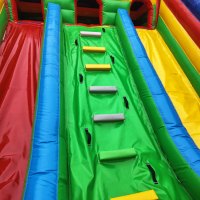 Château gonflable commercial en PVC avec toboggan et pistes d'escalade, équipement de terrain de jeu gonflable pour enfants, idéal pour la location événementielle et les grandes entreprises