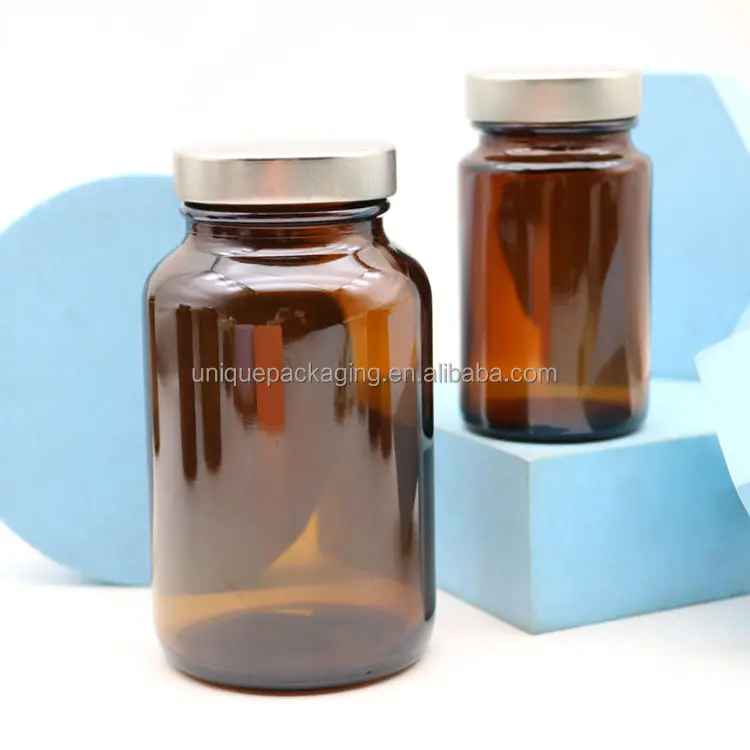 Botella de vidrio de píldora de cápsula médica farmacéutica ámbar de boca ancha de 250ml 100ml 150ml 200ml con tapas de lata para cápsulas