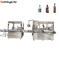 Machine de remplissage automatique de liquides de type linéaire pour spiritueux, jus de fruits, huile de cuisson avec machine de lavage de bouteilles