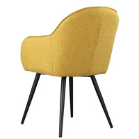 Fauteuil de cuisine élégant et confortable, recouvert de tissu en lin, avec pieds en métal noir