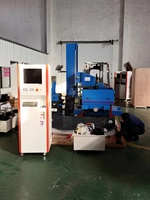 Machine de découpe de fil CNC de haute précision et de bonne qualité DK7750 EDM, machine de découpe de fil CNC EDM pour la découpe d'objets de travail