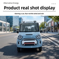 Véhicule électrique à quatre roues entièrement fermé, nouvelle énergie, avec deux rangées de pick-up pour le transport de marchandises et une utilisation active
