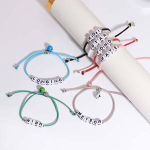 Bracelet d'amitié en velours coréen tressé, style minimaliste, avec perles lettres et clochette, idéal pour les fêtes et cadeaux - Vente en gros usine - Product Image 1