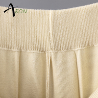 T-shirt ample à col rond et pantalon large décontracté de couleurs unies pour le printemps et l'été Ensemble 2 pièces en tricot pour femmes
