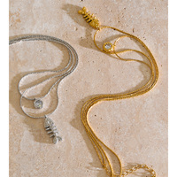 Collier double couche JINYOU 8657 tendance en acier inoxydable plaqué or, étanche, avec pendentif en os de poisson et zircon cubique, chaîne serpent