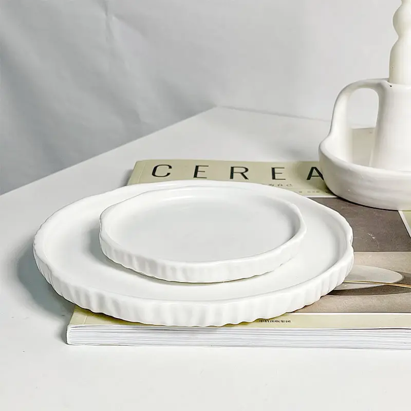 Plato plano de cerámica de bistec de porcelana blanca elegante clásico al por mayor para la cena en casa