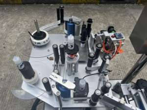 Aplicador de etiquetas de vial pequeño automático de Venta caliente para máquina de etiquetado de botellas redondas - Product Image 5