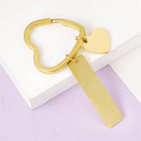 Porte-clés de couple de vente chaude de mode, porte-clés pendentif en forme de coeur à longue bande en acier inoxydable miroir personnalisé en gros
