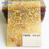 Feuilles fantaisie en acrylique-celluloid de couleur bleue avec paillettes, comme matériau de décoration