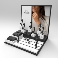 Plateau de présentation de montres en gros HUAXIN avec coussin, support de rangement pour bracelets, présentoir à bijoux pour magasin de montres