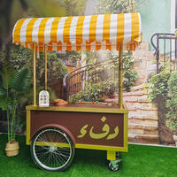 Chariot à bonbons détachable en métal, chariot de restauration mobile de rue, utilisation publicitaire, garantie 1 an, capacité personnalisée, 4 roues
