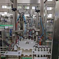 Ligne de remplissage électrique entièrement automatique de haute précision (99,99 %) pour applications aérosol, poudre, huile, valve de sac, boissons et produits chimiques