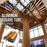 Colonne décorative en tube d'aluminium courbé en forme d'arbre, extrusion à effet bois pour la décoration artistique des halls intérieurs