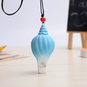 Pendentif sifflet en céramique colorée en forme de coquillage dégradé pour enfants, jouet musical - Product Image 4