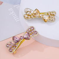 Barrette à cheveux élégante style coréen avec nœud en diamant, pour femme, en alliage et strass, idéale pour mariage, fête ou usage quotidien – Nouvelle collection très prisée