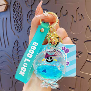 Hecion พวงกุญแจใบหน้าอีโมสีสันของเหลว, พวงกุญแจแฟชั่นจี้กระเป๋านักเรียนพวงกุญแจอะนิเมะ4สี - Product Image 3