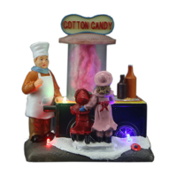 OEM & ODM Weihnachts ferien Indoor Decor Handmade Luminous Resin Led Village Häuser mit spielenden Dart Figur & Spielzeug