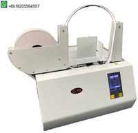 Machine automatique de cerclage de billets de banque avec ruban thermoscellant