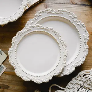Vente en gros d'assiettes en relief vintage en céramique pour mariage à l'hôtel plats de table en céramique assiettes pour cuisine ensembles d'assiettes en céramique