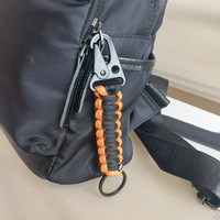 Vente en gros de porte-clés portable en polyester accessoires de camping et de randonnée en plein air avec boucle paracorde pour les sports d'aventure