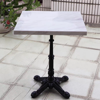 Café d'extérieur Pierre artificielle frittée Table en métal pour jardin Balcon Ensemble table et chaise durables et imperméables