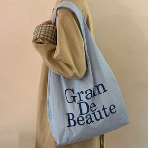 Sac à main en toile de coton simple pour usage quotidien, personnalisable avec logo, réutilisable, impression de lettres, vente en gros - Product Image 3