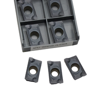 Plaquettes de fraisage en carbure APKT1604PDR-76 IC928 PVD TiAlN 85 °   Plaquettes de fraisage CNC à coefficient de régression positif R0.8