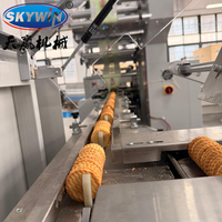 Machine d'emballage entièrement automatique pour barres énergétiques aux céréales, chocolat, biscuits, gâteaux et barres protéinées