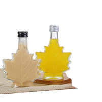 Fabricant de petites bouteilles de sirop d'érable et de vin Vente en gros 250ml 100ml 50ml Mini bouteilles en verre avec feuille d'érable