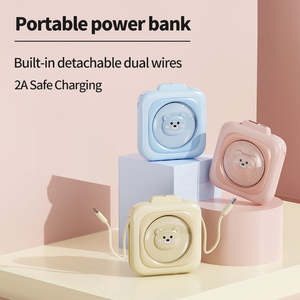 Prodotto di tendenza Mini 10W piccolo Power Bank portatile 5000/10000mAh grazioso modello Design Build-in cavo <span class=keywords><strong>stazione</strong></span> di ricarica per i viaggi - Product Image 2